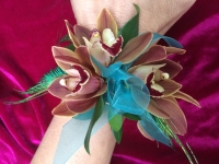 Cymbidium Orchid and Peacock Feather Wrist Corsage