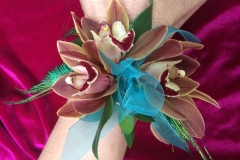 Cymbidium Orchid and Peacock Feather Wrist Corsage
